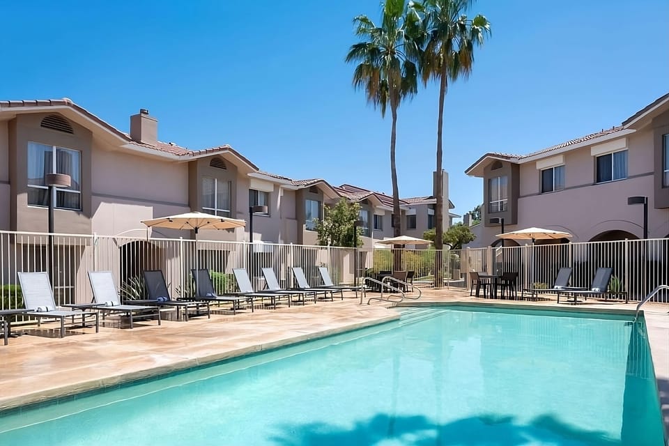 Soak up sunshine beside the sparkling pool and loungers.