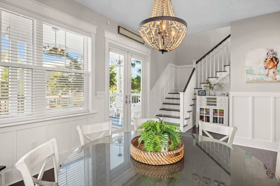 Dining Room: 7-person dining table, access to main floor porch