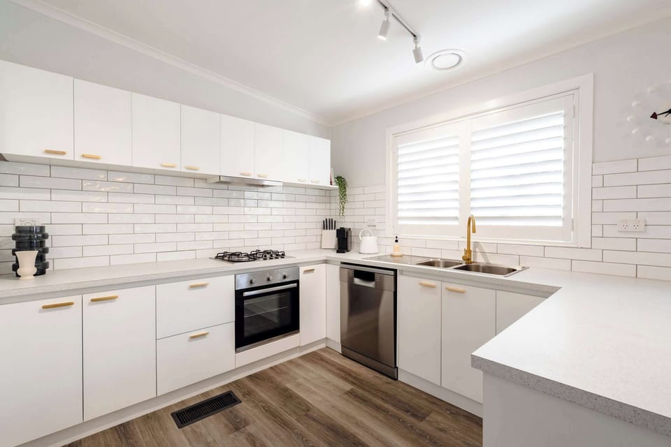 Fully renovated kitchen with stainless steel appliances