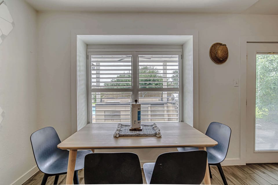 Gather for meals together at the dining table, seating 5