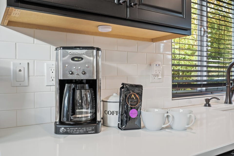 12-cup drip coffee maker with initial supply of ground coffee provided