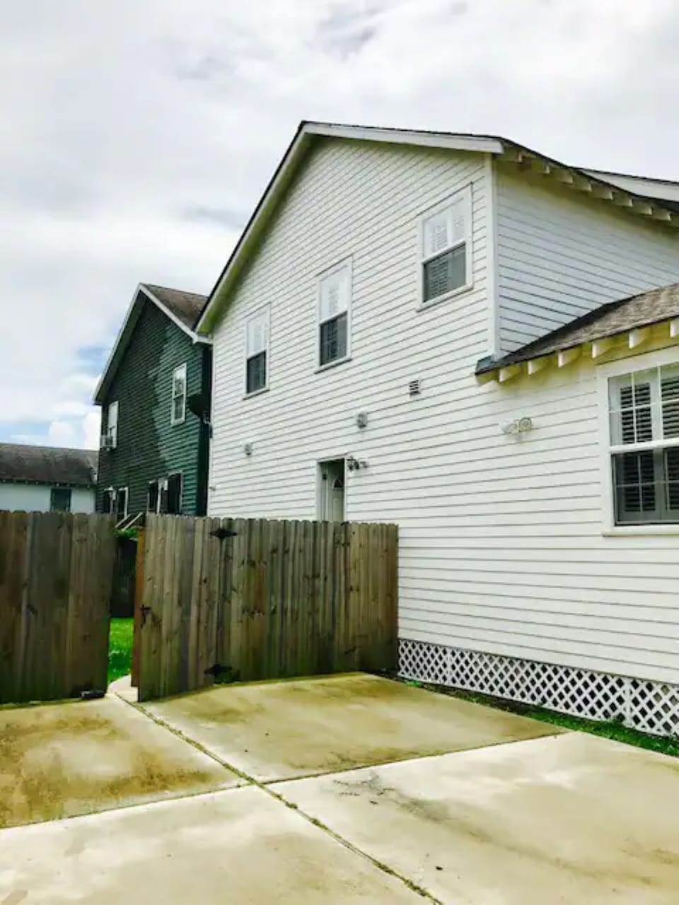 Driveway; gate entrance to unit, which is private.