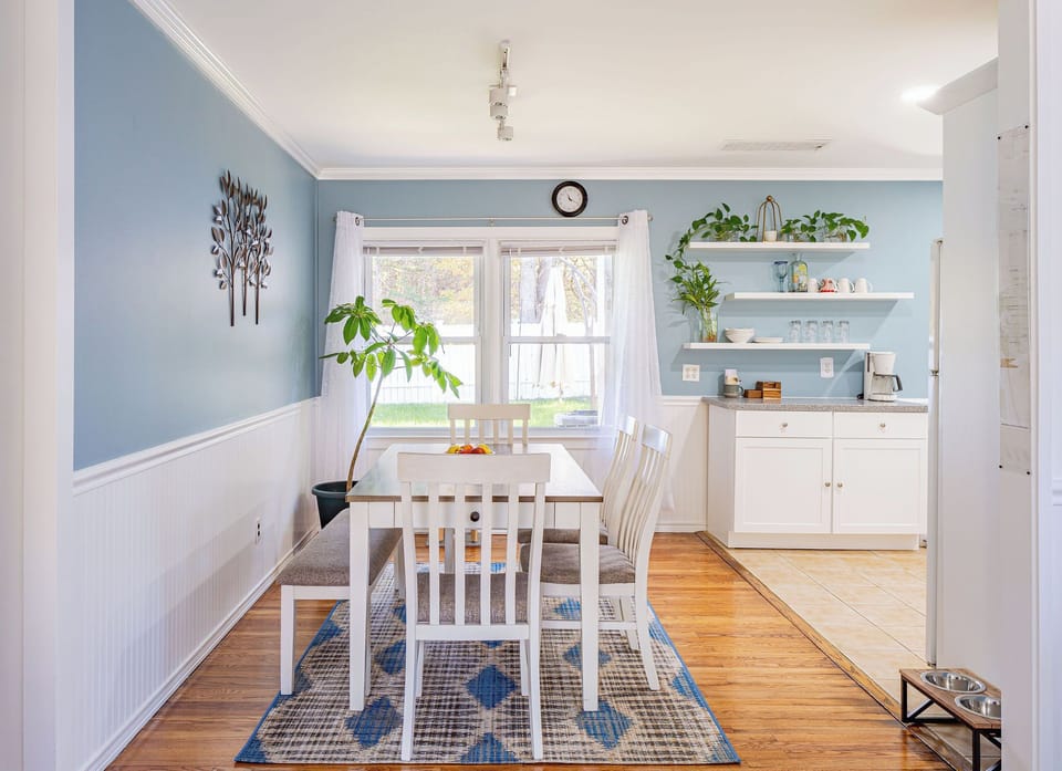 Open concept dining area with seating for six.