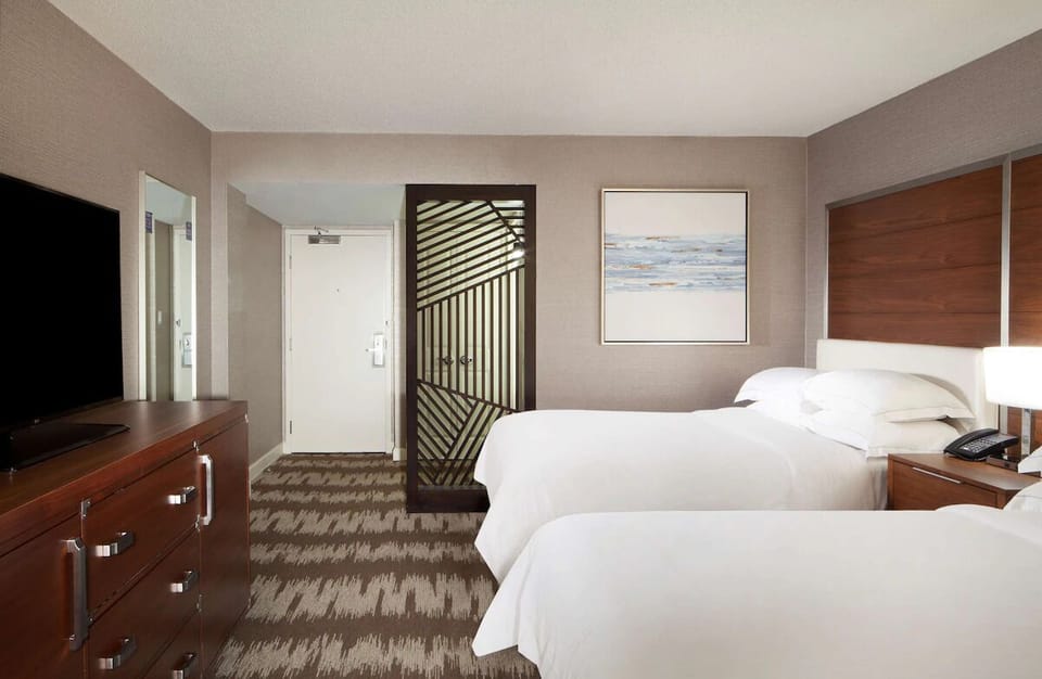 Settle in easily with a spacious layout and restful bedding.