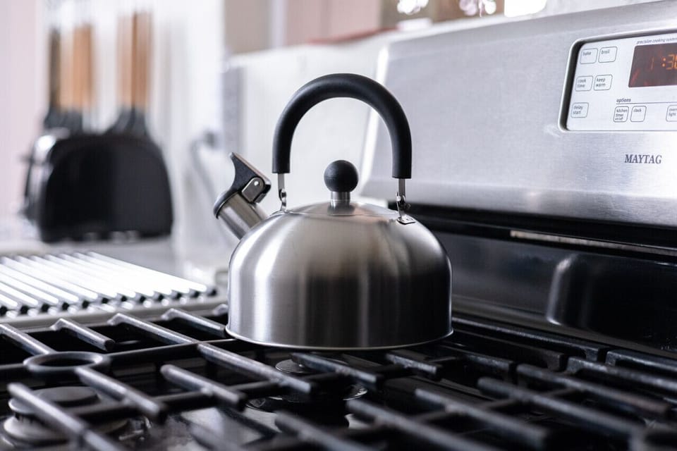 Cozy kitchen vibes with a trusty kettle at the ready.