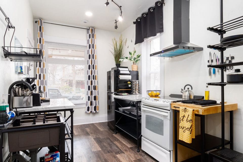 Modern, industrial-style kitchen with ample counter space and storage.
