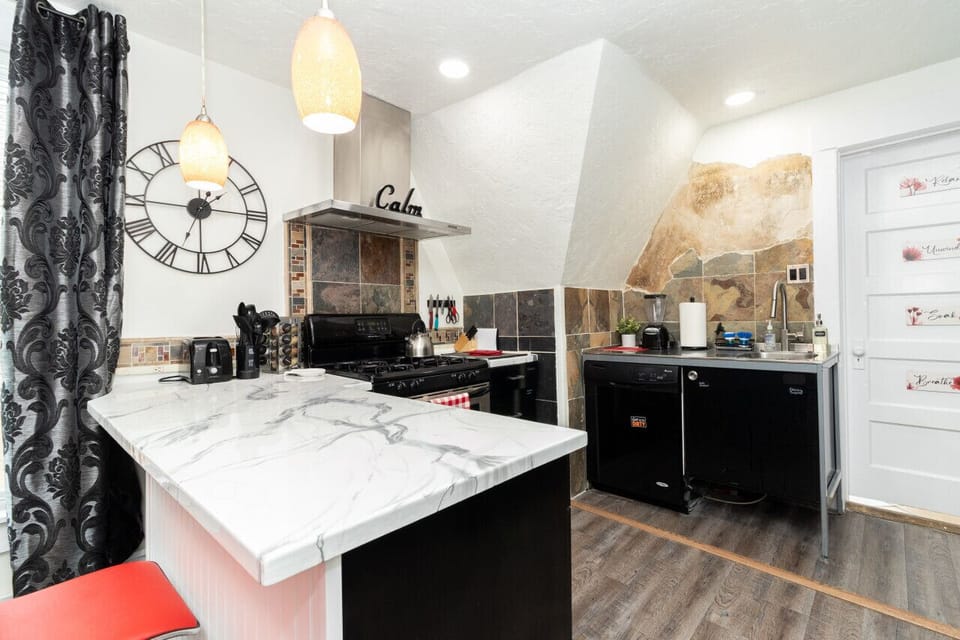 Spacious kitchen with ample counter space and a convenient layout.