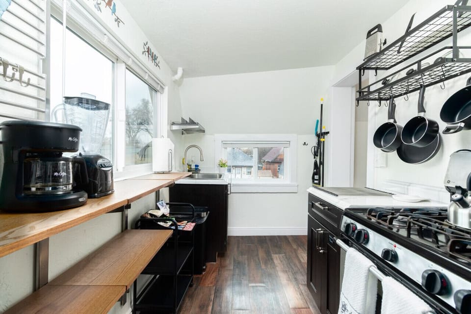 Modern amenities in a charming, functional kitchen.