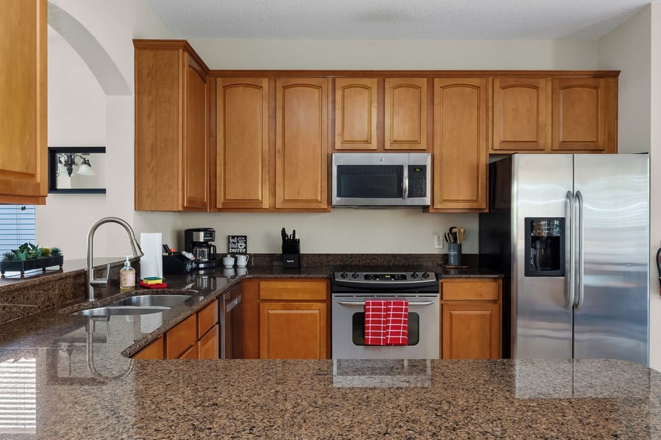 Whip up delicious meals with modern appliances and a delightful open layout!