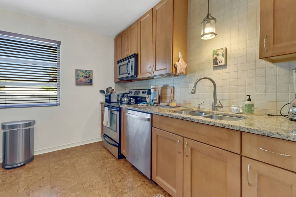 Cookware, dinnerware, many kitchen tools and small appliances are provided for your use, including a Keurig coffee maker.