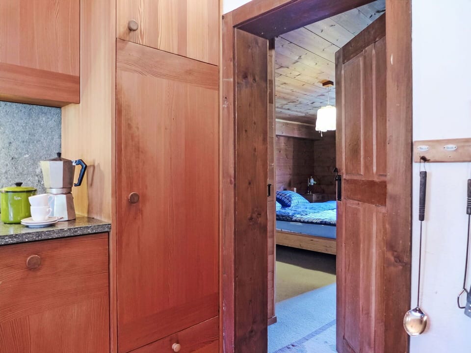 Property, Cabinetry, Wood, Floor, Wood Stain, Tableware, Flooring, Building, Hardwood