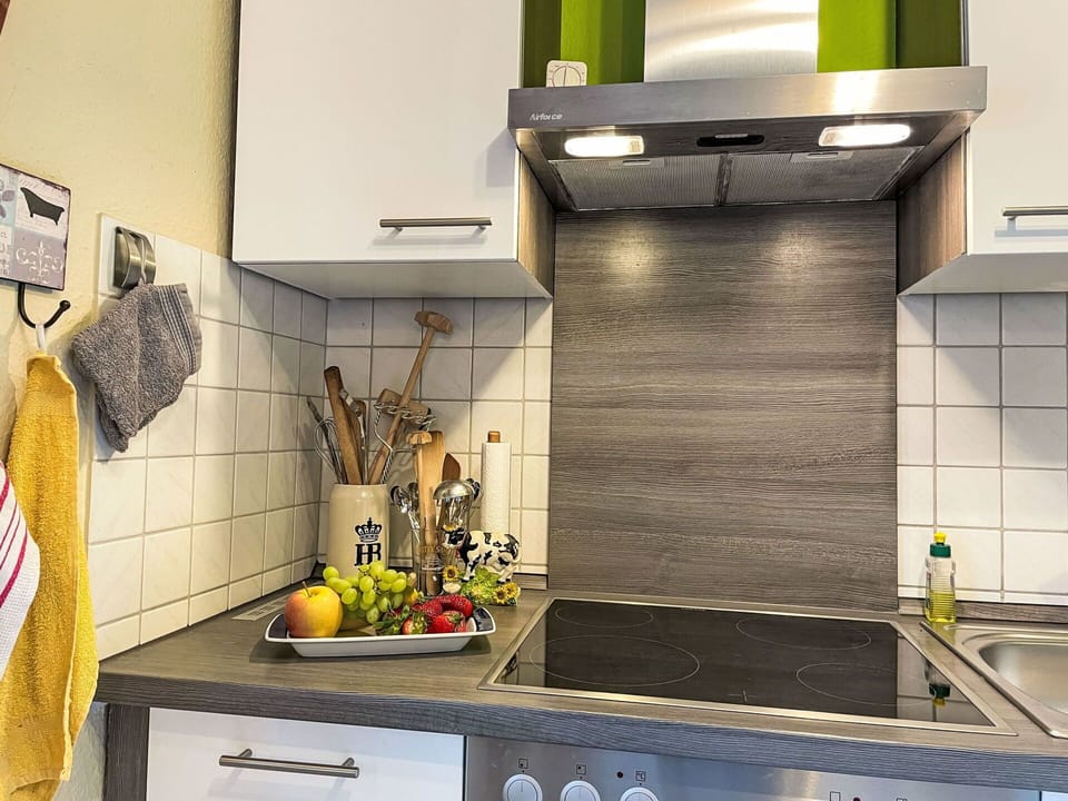 Kitchen, Countertop, Kitchen Appliance, Interior Design, Home Appliance, Major Appliance, Cabinetry, Flooring, Kitchen Sink, Kitchen Stove