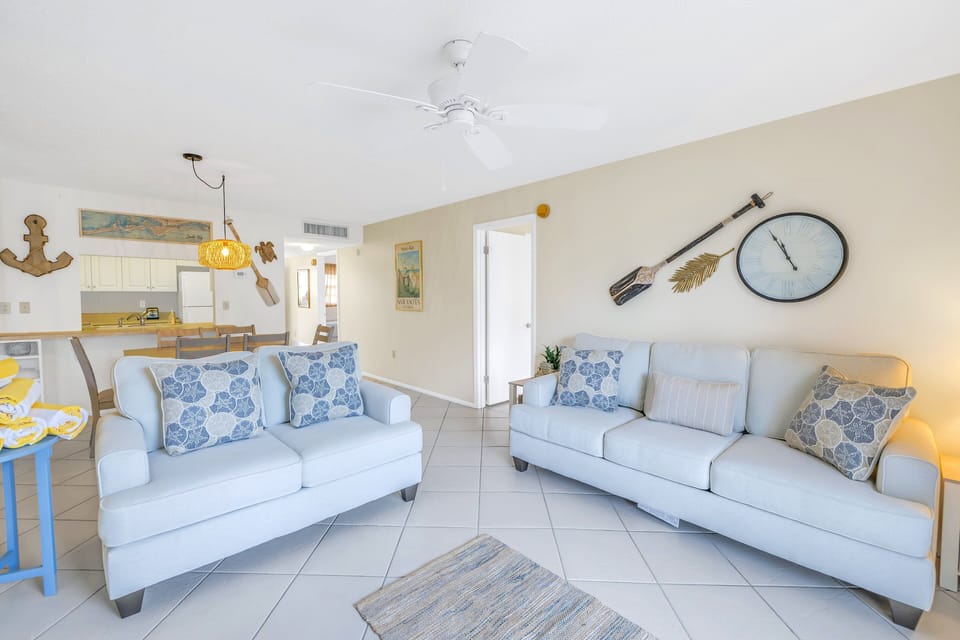 Living area spacious and sunny leading to dining.