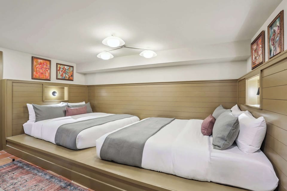 Bedroom 1 | Two King Beds with 75 Inch TV Sitting Area | Ground Floor