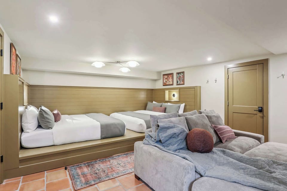 Bedroom 1 | Two King Beds with 75 Inch TV Sitting Area | Ground Floor