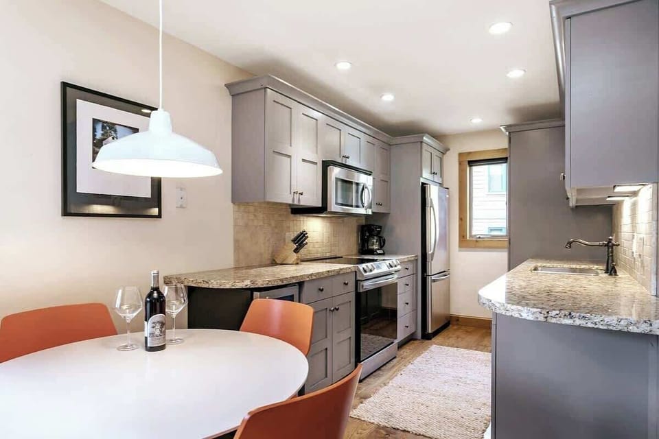 Updated, fully-stocked kitchen with plenty of space for cooking.