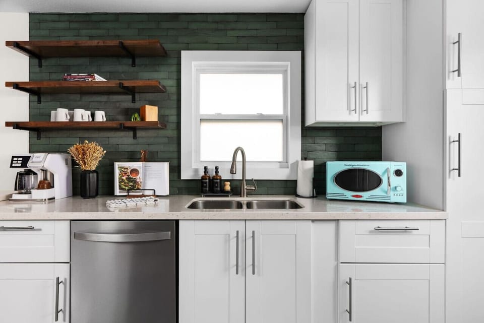 Whip up delicious recipes with our curated cookbook, or quickly reheat your favorites in the vintage-style microwave