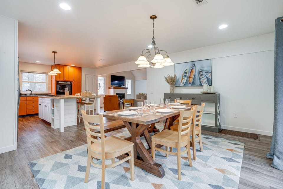 Dining room with the kitchen in the background