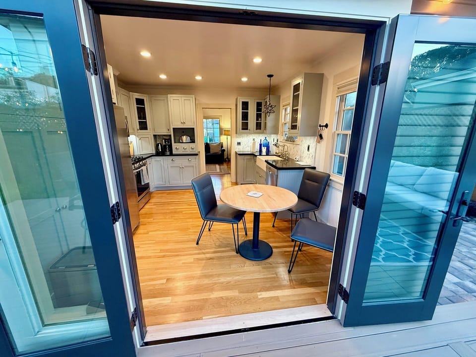French doors create an open indoor outdoor space.