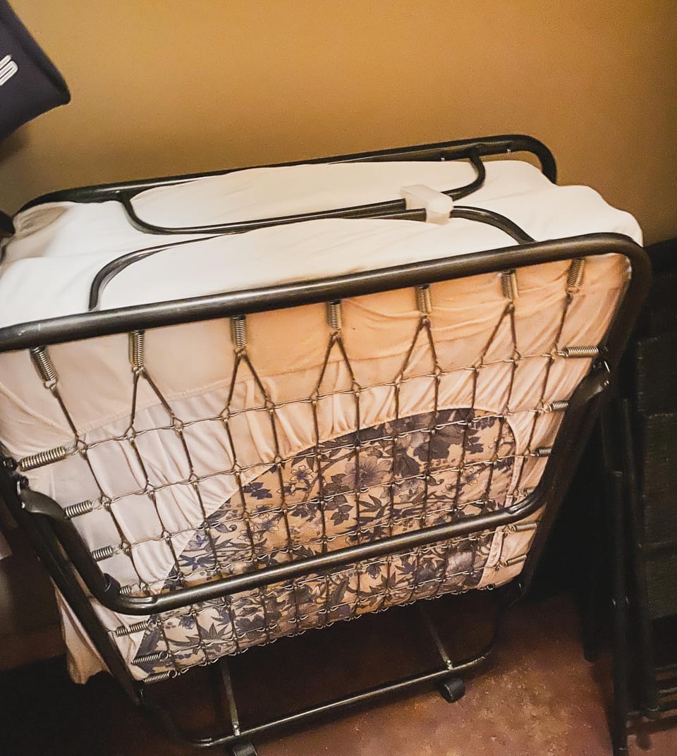 Roll away twin cot in closet of Room #3. 