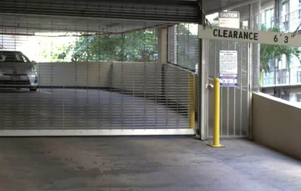 buildings onsite parking structure.  The clearance is 6'3.  1 parking included 