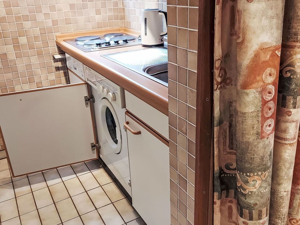 Laundry Room, Cabinetry, Property, Sink, Kitchen, Home Appliance, Plumbing Fixture, Countertop, Wood, Interior Design