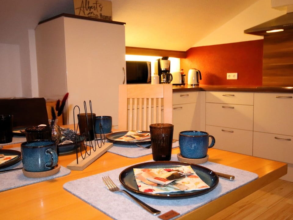 Furniture, Interior Design, Countertop, Kitchen, Tableware, Kitchen Appliance, Lighting, Cabinetry, Room, Chair