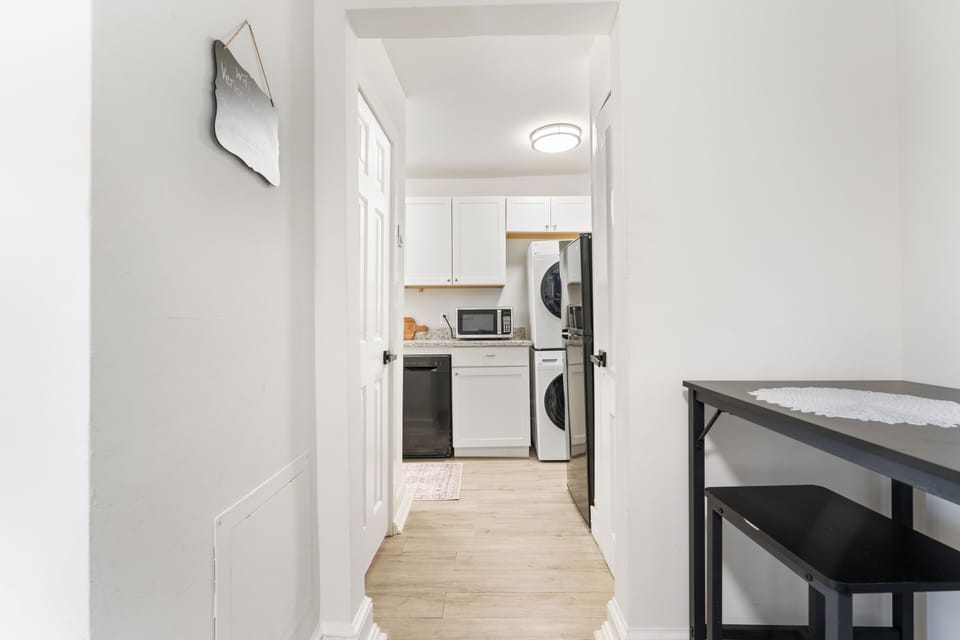 Enjoy this modern kitchen with appliances, ample counter space, and style.