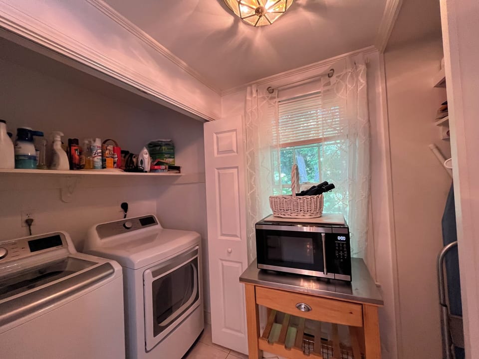 Utility room with washer and dryer