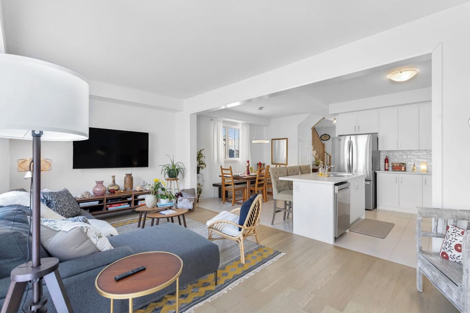 A cozy, comfortable relaxing living room, TV, books, games, sofa, open space.