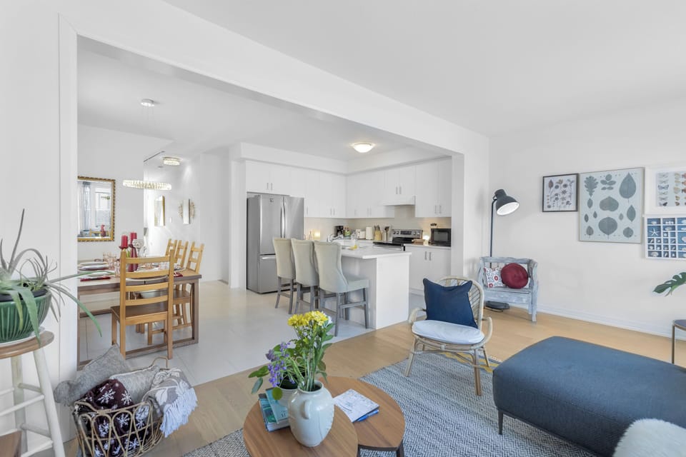A cozy, comfortable relaxing living room, TV, books, games, sofa, open space.