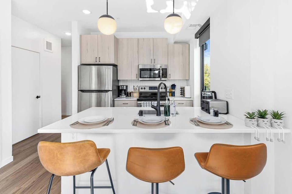 Gather around the dining table for a meal or conversation, comfortably.