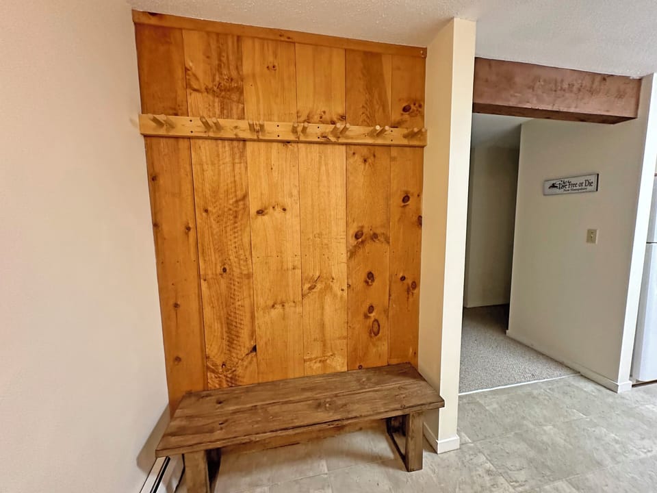 Entryway bench is convenient for shoes and coats
