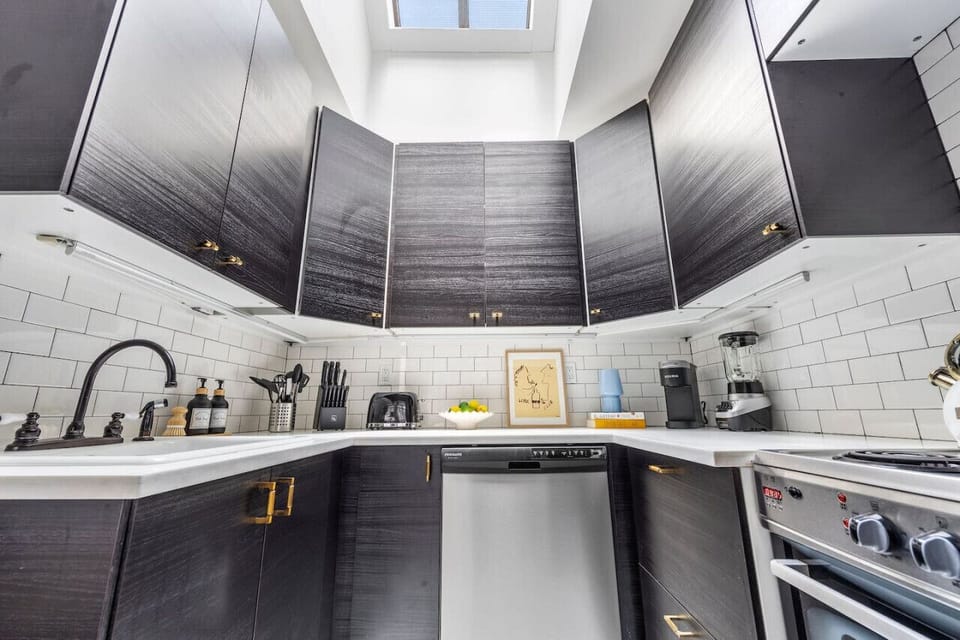Designer kitchen with cutting-edge appliances and storage