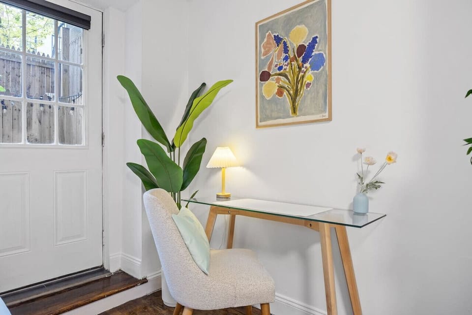 Workspace with comfortable chair and glass desk