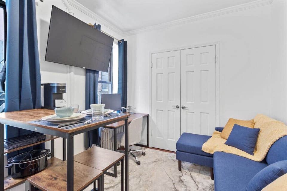 Cozy and vibrant living room with wide flat screen TV