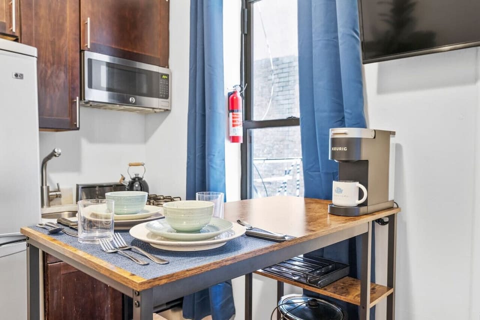 Complete dining area set for two with coffee machine