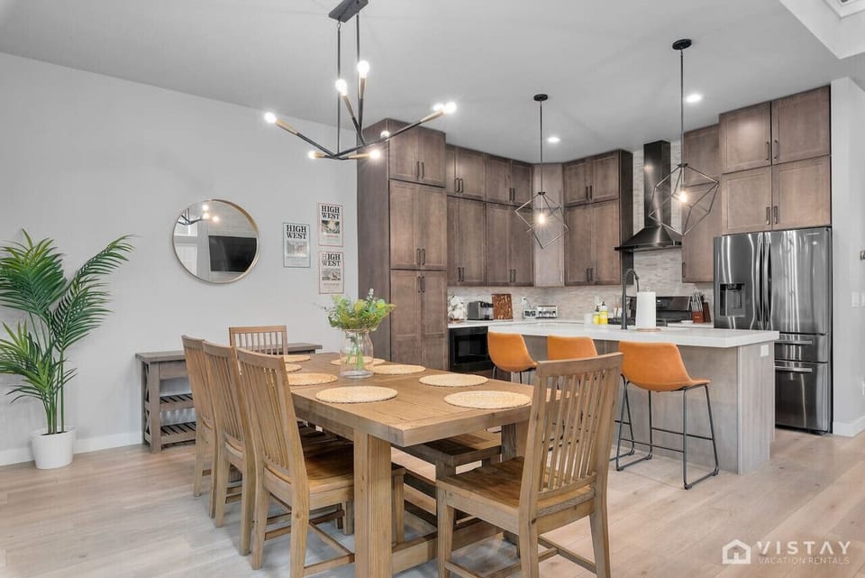 Dining table with seating for eight, perfect for family meals or gathering with friends.
