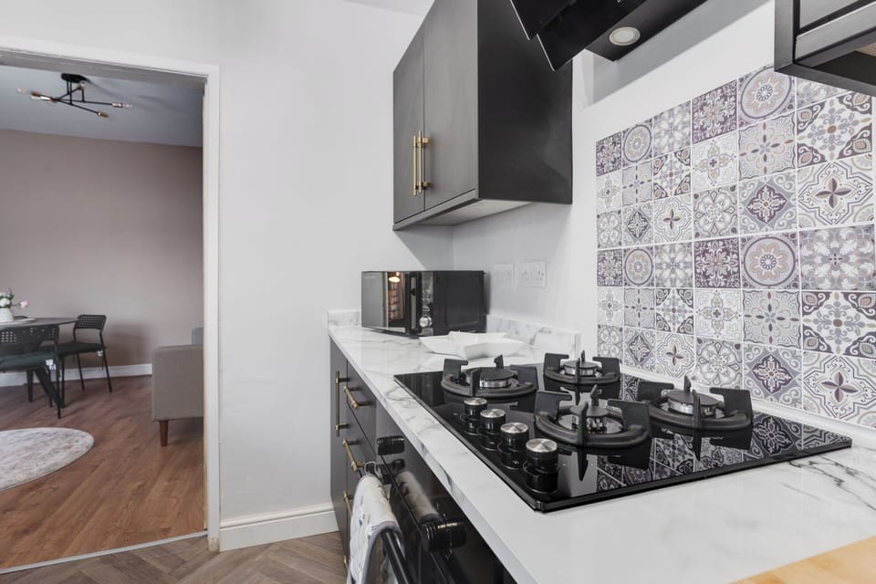 Beautifully appointed kitchen with everything you need to cook and dine in comfort. Complete with a washing machine and thoughtful essentials, it's perfect for everything from weekend breaks to extended stays.