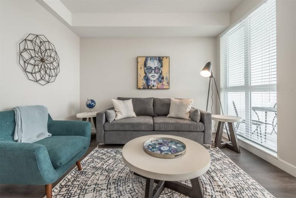 Living room sofa convertible to a queen bed, perfect spot for binge-watching your favorite shows!