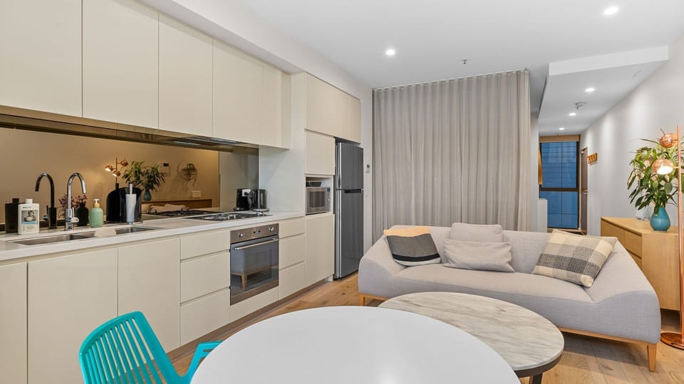 Everything you need, all in one room: Relax, cook, and unwind in this spacious, well-equipped apartment.