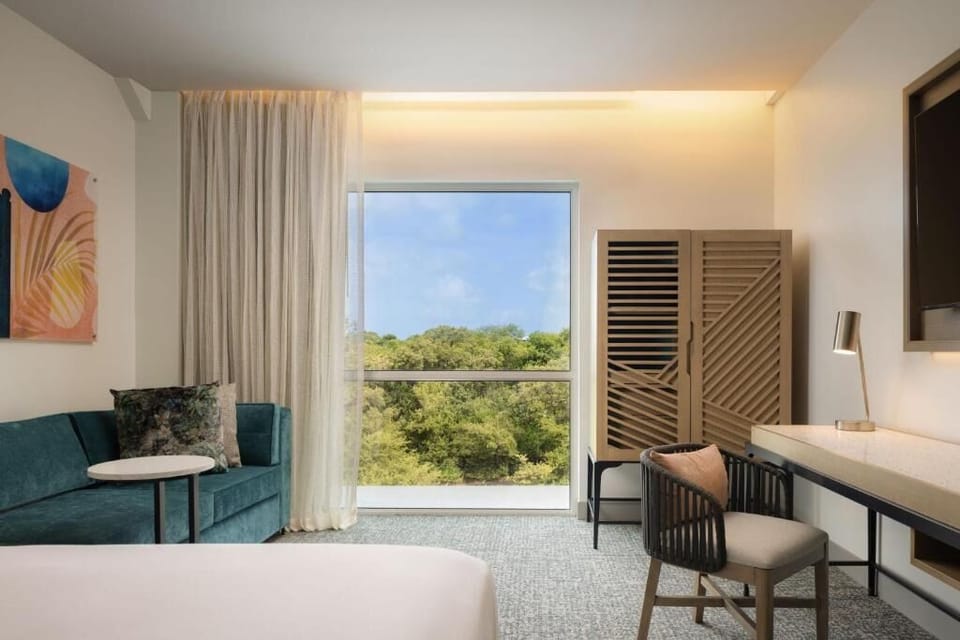 Wake up to treetop views, then work comfortably by the window.