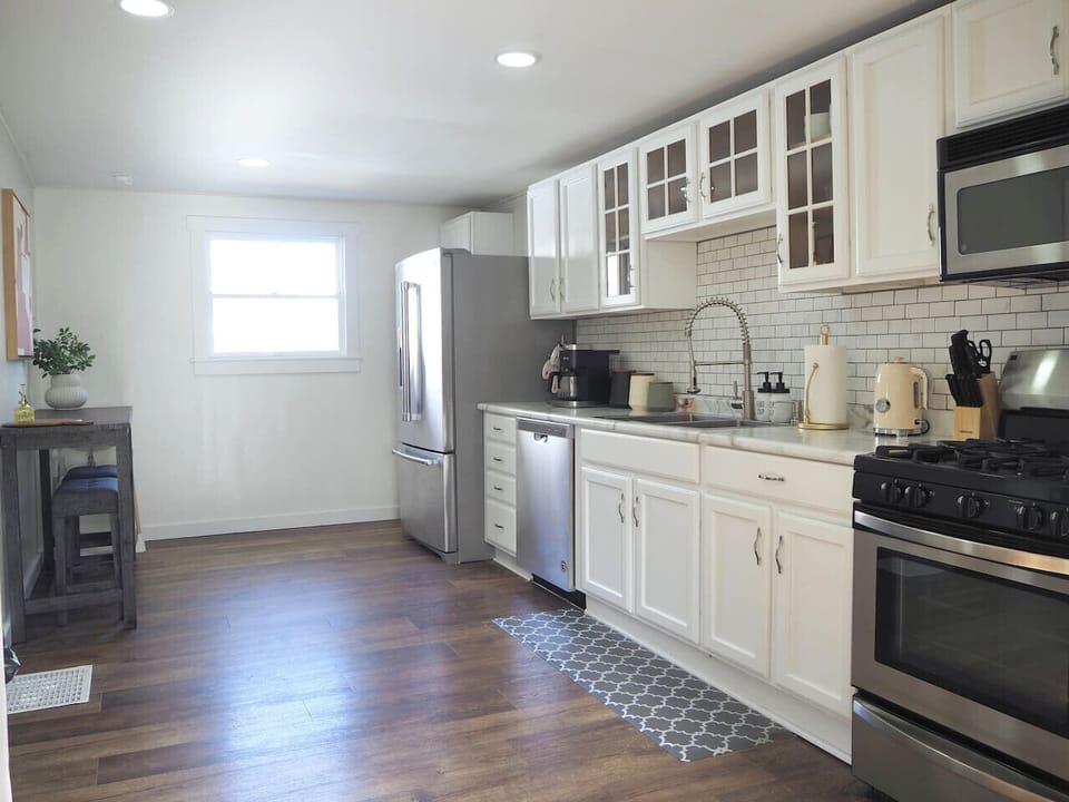 Bright kitchen with modern appliances and generous counter space.