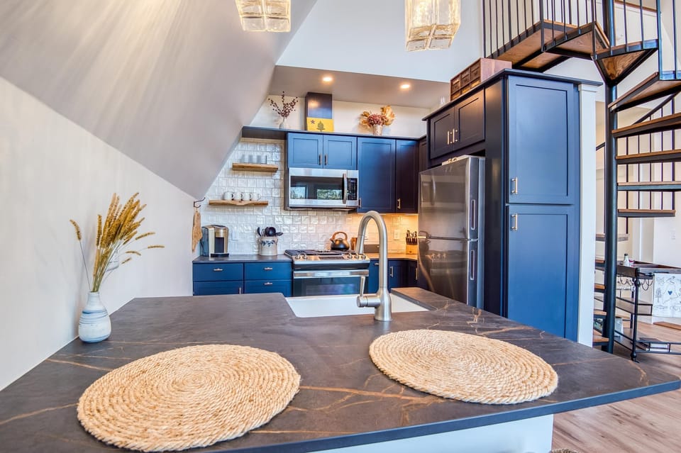 Two bar seats in kitchen.