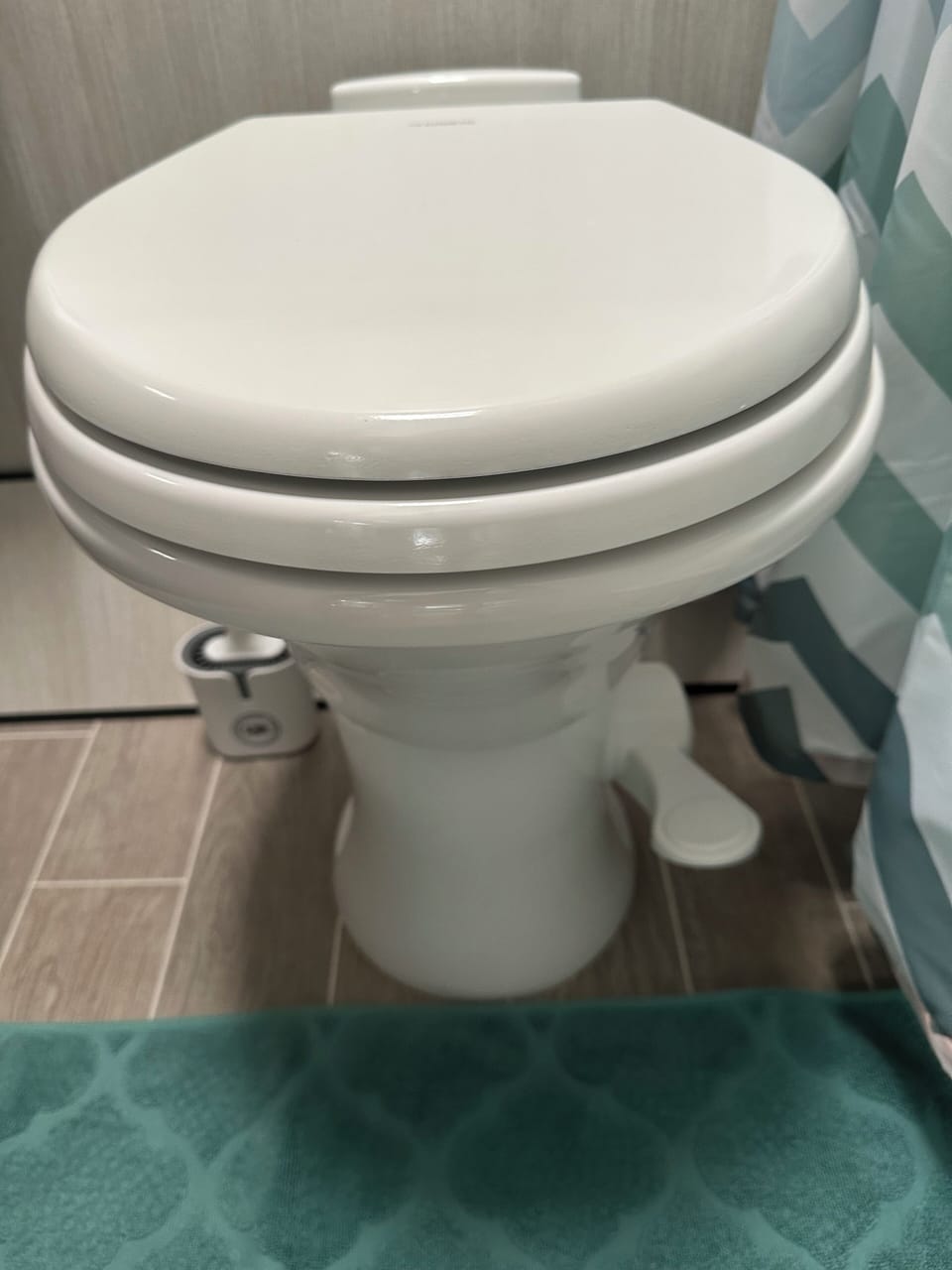 Depress floor pedal fully to flush.  Refill bowl by slightly depressing pedal.