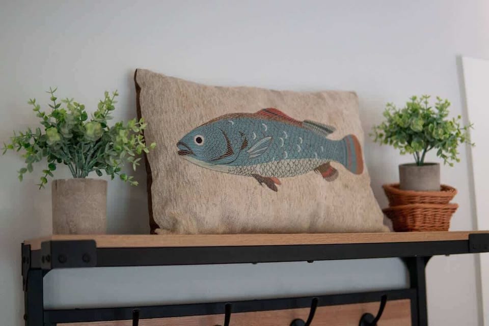 Classic lake vibes inside and out, with plenty of space for your dog to settle in.