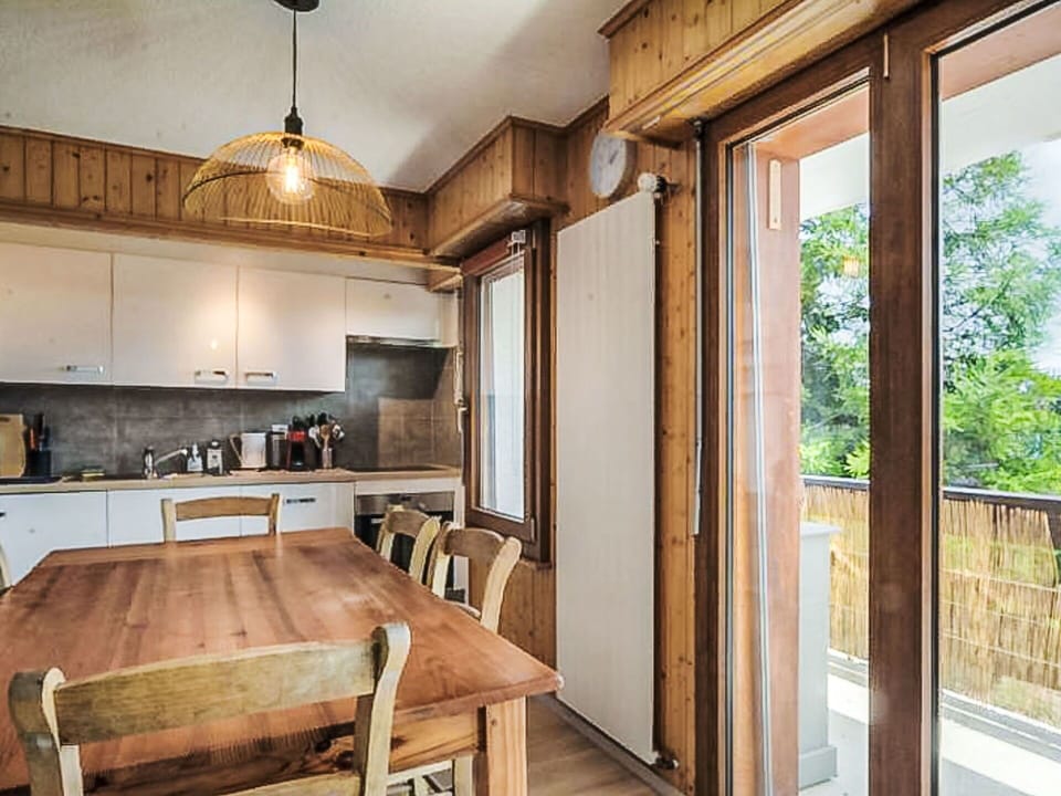 Furniture, Property, Table, Countertop, Wood, Interior Design, Lighting, Wood Stain, Chair, Floor