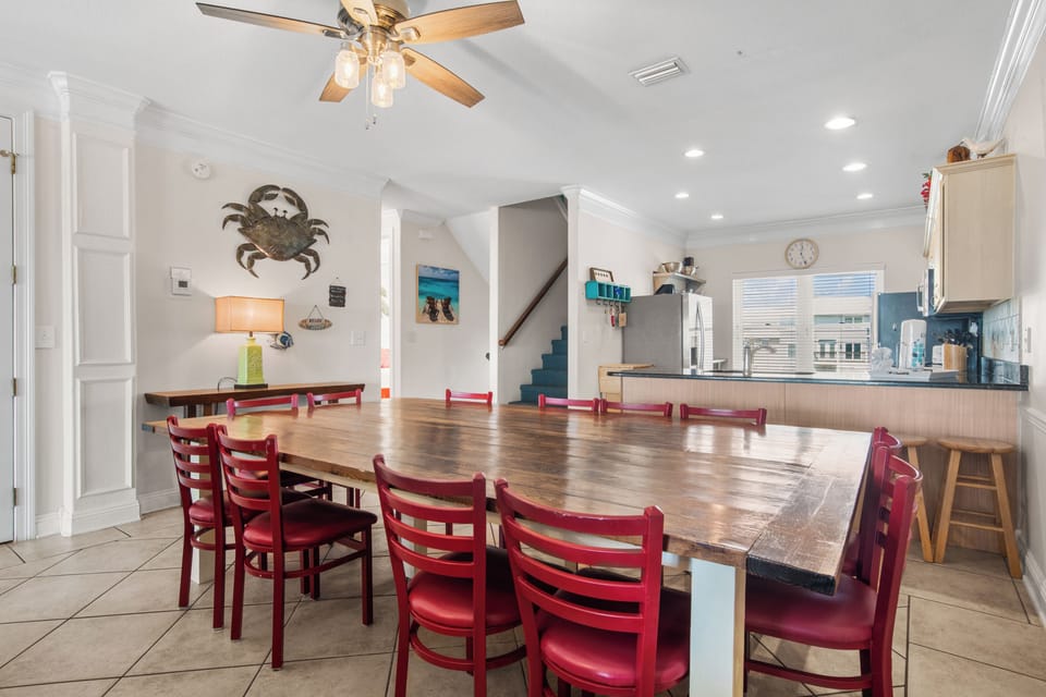 Dining table seating for 13 with 4 additional at the kitchen peninsula