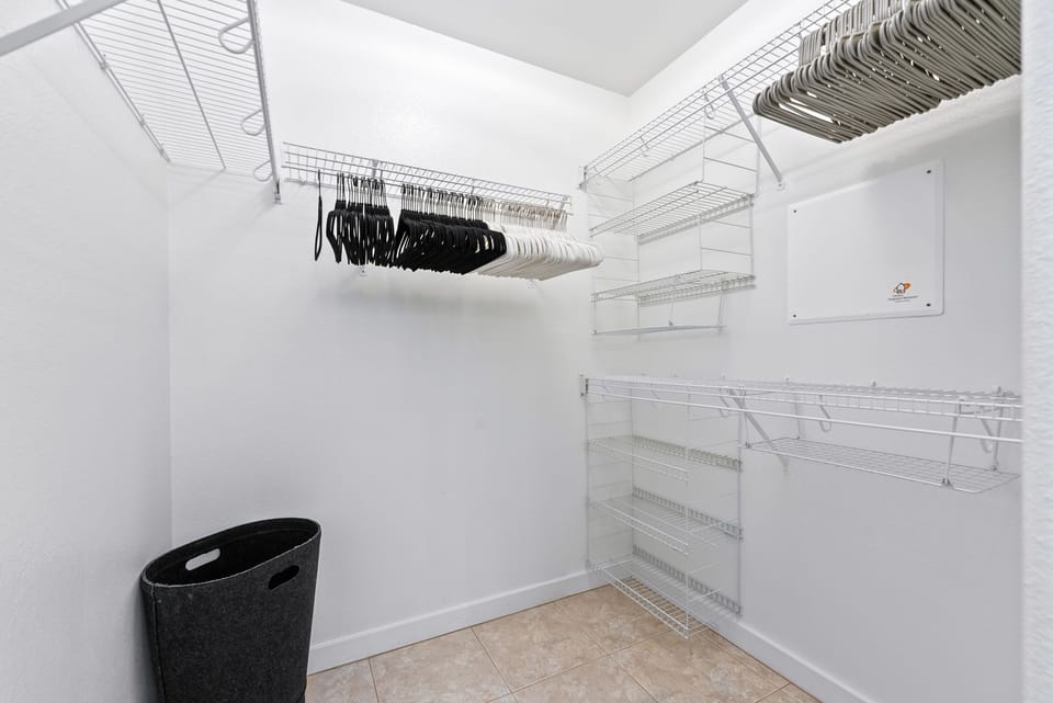 Generous walk-in closet with ample storage space, perfect for keeping your belongings organized during your stay.