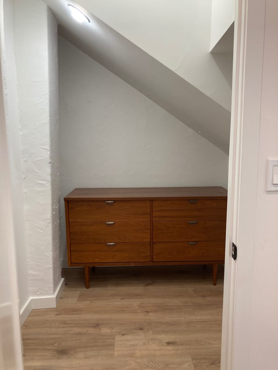 walk in closet with dresser